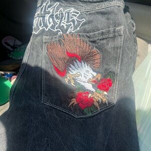 Original Use Black and Red Jeans with Artistic Design